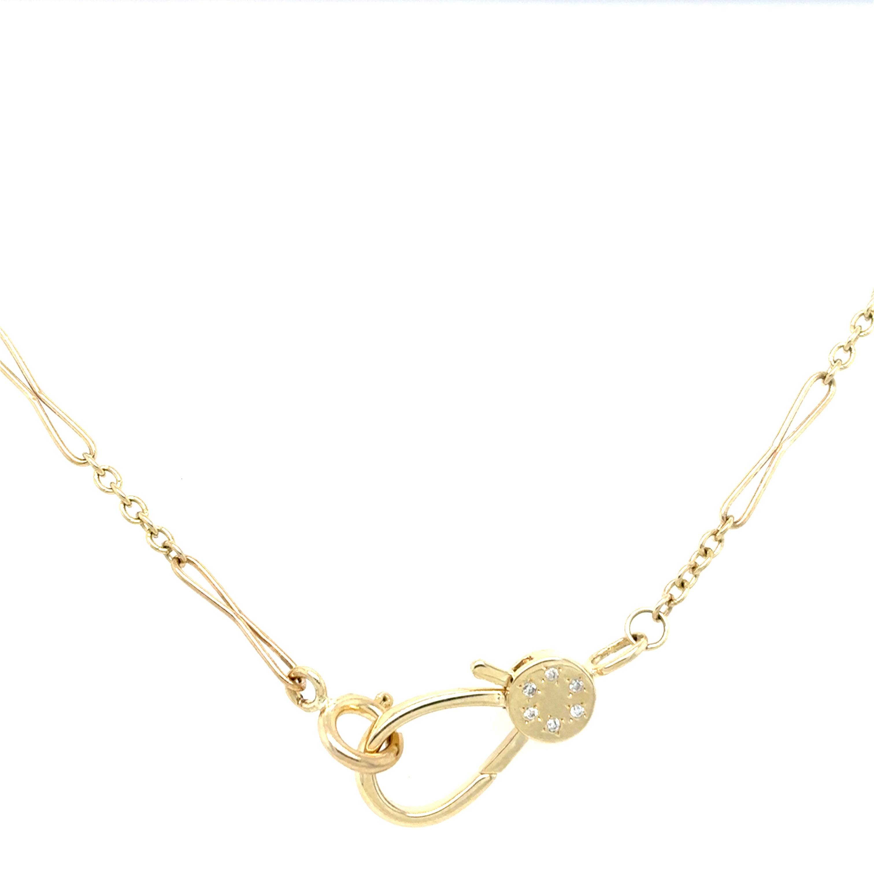 Gold necklace with a unique clasp design on a white background